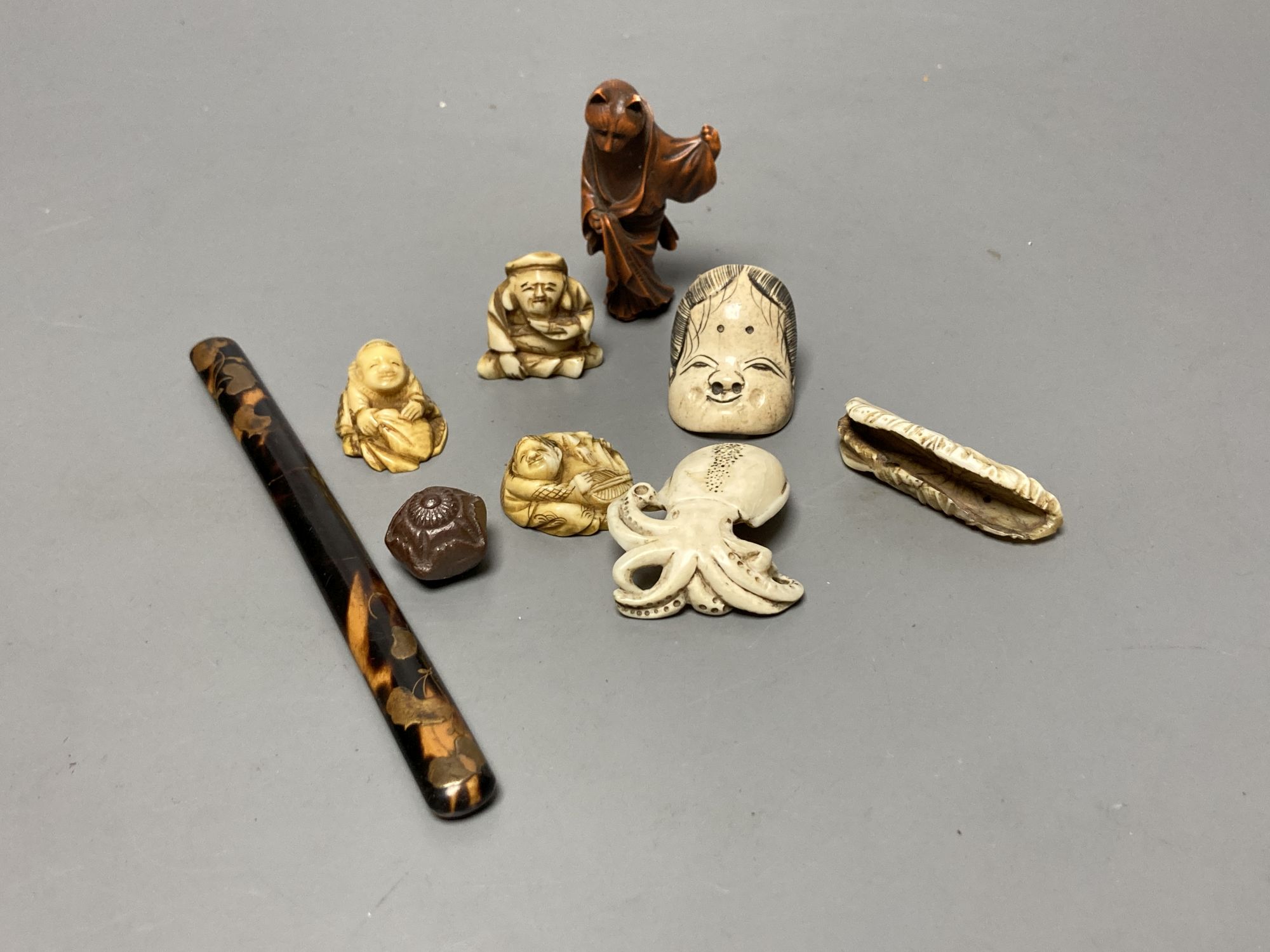 A quantity of assorted Japanese carvings, netsuke, etc.